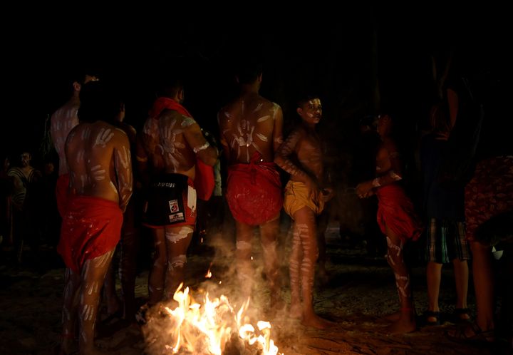 An Aboriginal dance group prepare to perform at Yaama Ngunna Baaka Corroboree Festival "to heal the Barka" on the bank of the Darling River. 