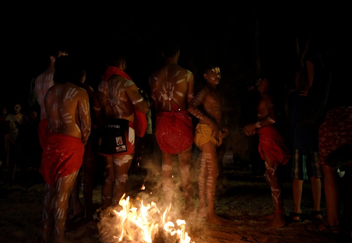 An Aboriginal dance group prepare to perform at Yaama Ngunna Baaka Corroboree Festival "to heal the Barka" on the bank of the Darling River.