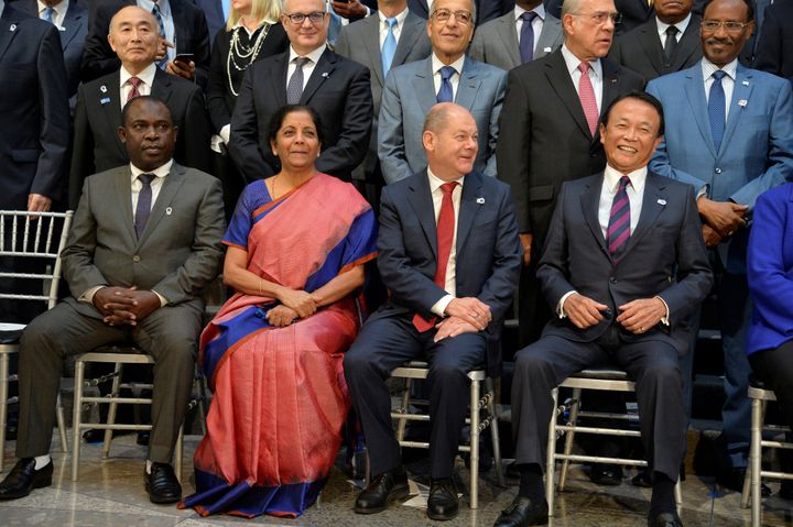 Cormoros' Finance Minister Said Ali Chayhane, India's Finance Minister Nirmala Sitharaman, Germany's Finance Minister Olaf Scholz and Japan's Finance Minister Taro Aso prepare for a group photo during the IMF and World Bank's 2019 Annual Meetings of finance ministers and bank governors, in Washington, U.S., October 19, 2019. REUTERS/Mike Theiler