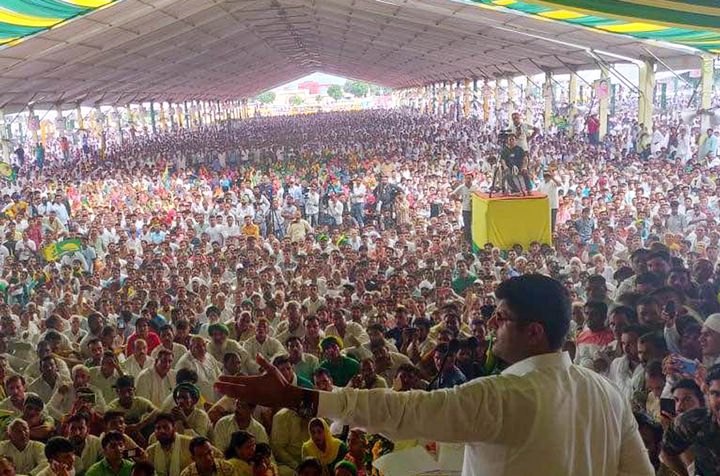 Jannayak Janata Party leader Dushyant Chautala addresses a Jan Samman Divas Rally, at Mela Ground, on September 22, 2019 in Rohtak, India. 