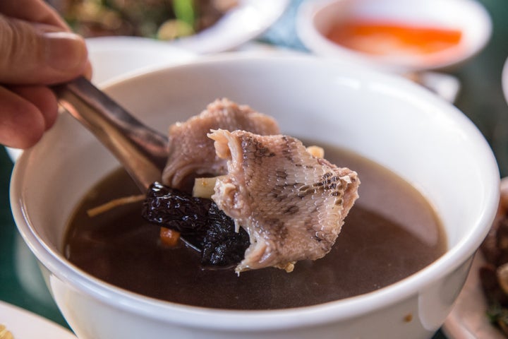 Cobra soup near Hanoi, Vietnam 