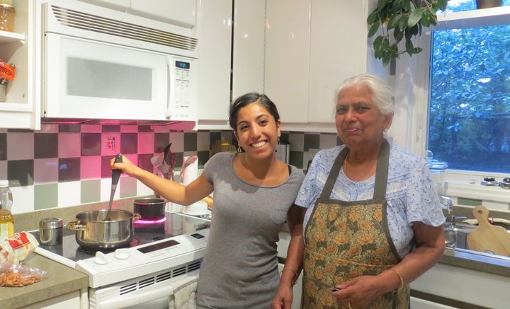 The author attempts to learn to cook Indian food from her nani (maternal grandmother), right.