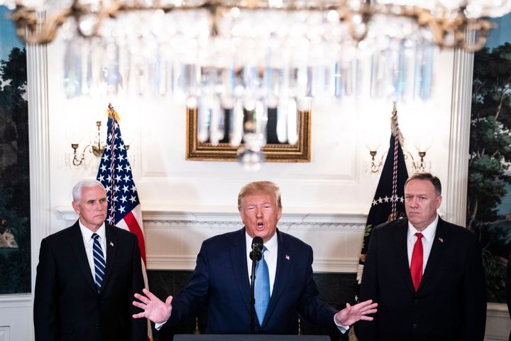 President Donald Trump, flanked by Vice President Mike Pence and Secretary of State Mike Pompeo, announces that the U.S. will lift sanctions on Turkey and the cease-fire in Syria will be permanent on Oct 23, 2019, in Washington, D.C.