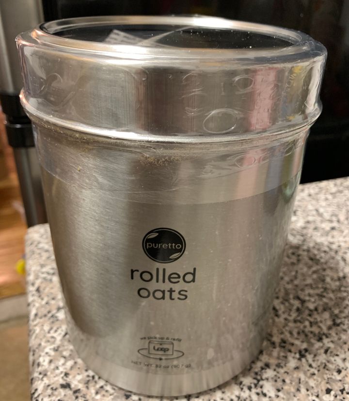 My tin of rolled oats, with the clear plastic seal around the lid. Loop says you can send these seals back with your empties to be recycled by its parent company, which specializes in hard-to-recycle items.