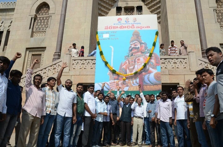 Students and faculty observe Naraka Shoora Vardanthi at Osmania University in 2012.