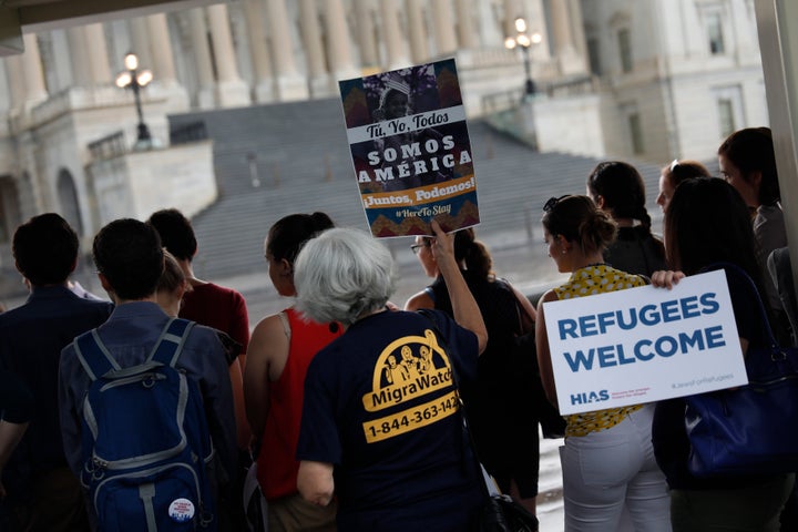 Activists hold signs during a demonstration organized by HIAS, founded as the Hebrew Immigrant Aid Society, outside the U.S. Capitol on Sept. 14, 2017, in Washington, D.C.