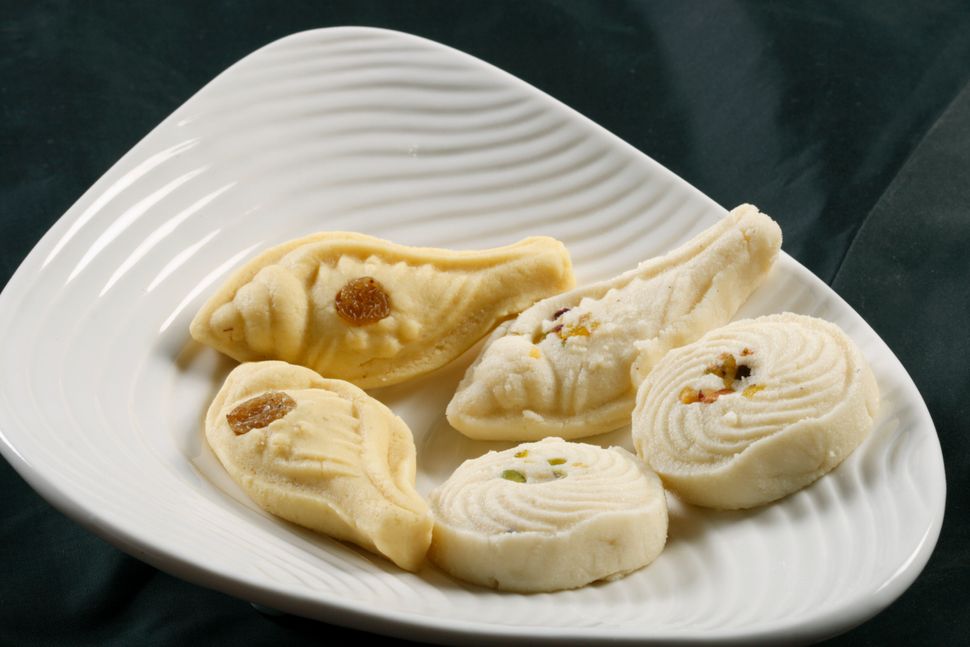 Sandesh is traditional bengali sweet dish prepared with cottage cheese.