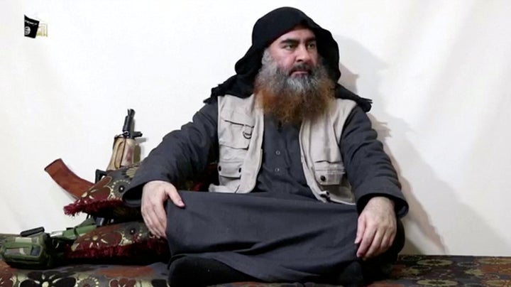 A bearded man believed to be ISIS leader Abu Bakr al-Baghdadi speaks in a screengrab taken from a video released on April 29,
