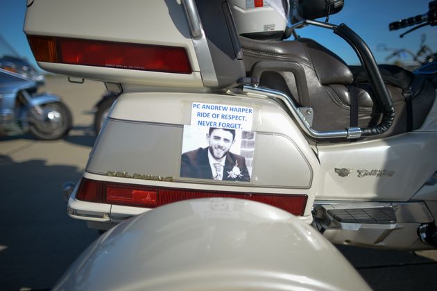 A picture of PC Andrew Harper stuck to a Honda Goldwing motorbike