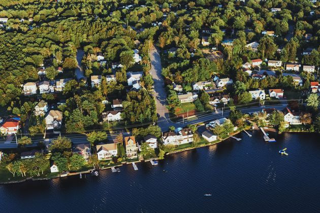 An aerial view of homes lining the shoreline of Lake Micmac in Dartmouth,