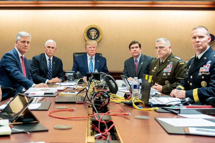 U.S. President Donald Trump, U.S. Vice President Mike Pence (2nd L), U.S. Secretary of Defense Mark Esper (3rd R), along with members of the national security team, watch as U.S. Special Operations forces close in on ISIS leader Abu Bakr al-Baghdadi, in the Situation Room of the White House. 