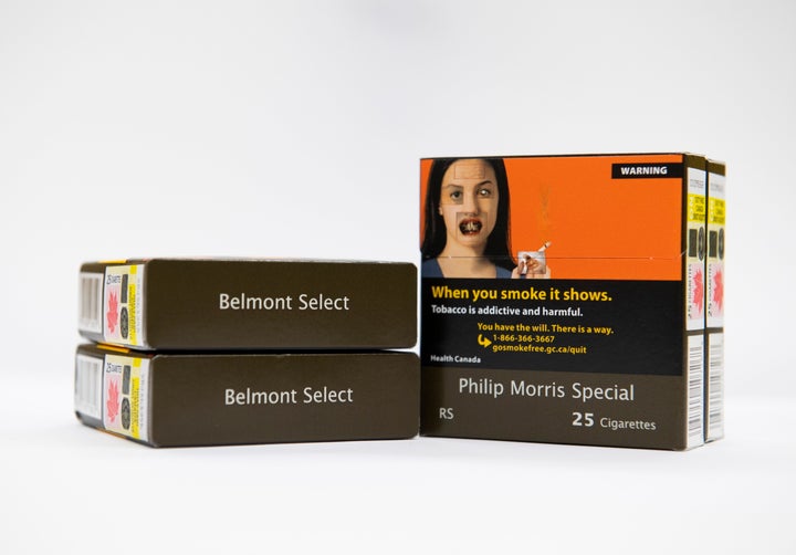 Here's a look at how cigarettes will be sold in Canada with plain packaging, as seen here in Ottawa on Oct. 17.