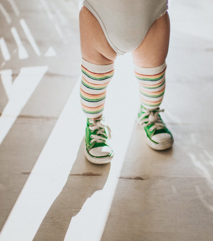 All you need is a onesie, leggings, and a headband.