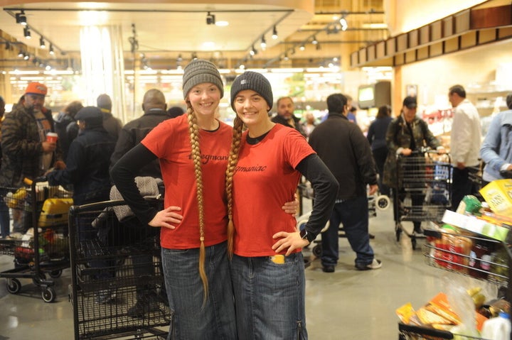 Kathryn Cortez (L) flew to Rochester, New York, from Wisconsin and drove down with her sister, Marie Palmer (R). "I've always really wanted to come to a store opening so badly," Marie, an employee at Wegmans herself, told HuffPost.