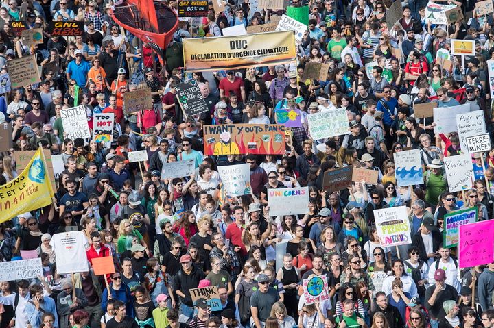 Demonstrators march during a climate strike in Montreal, Sept. 27, 2019.