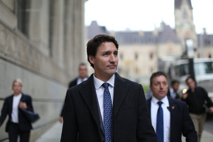 Prime Minister Justin Trudeau walks back to his office, Oct. 23, 2019 in Ottawa, after reiterating his support for the Trans Mountain expansion project at a news conference. 