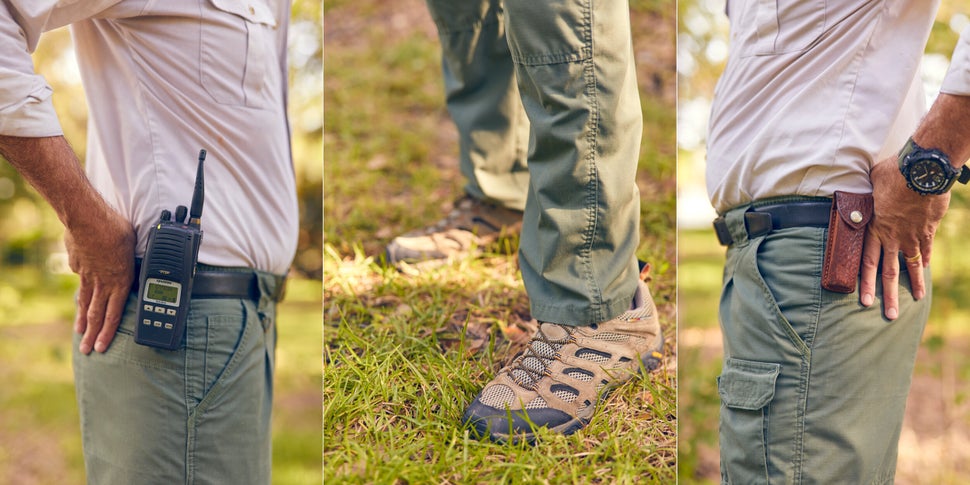 Magill shows the clothing he wears daily while working at Zoo Miami.