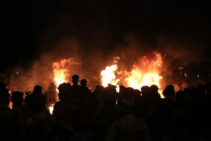 Burning tires light up the night skies during anti-government protests in the Shiite shrine city of Karbala on Monday night.