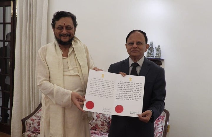 Principal Secretary to PM, PK Mishra, presents the warrant of appointment to Chief Justice of India designate, Justice SA Bobde.