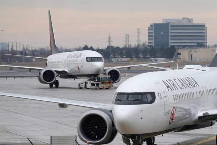 An Air Canada Boeing 737 MAX 8 aircraft is being towed at Pearson International Airport in Toronto on Mar. 13, 2019. 