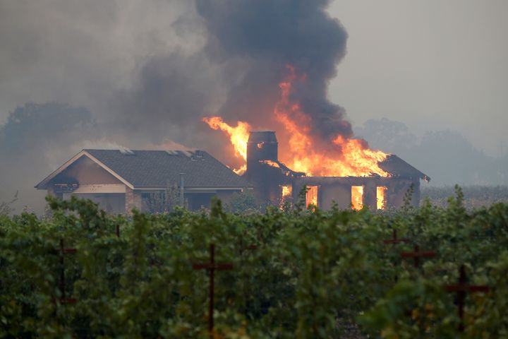 A building burns Thursday during the Kincade fire in Geyserville, California.
