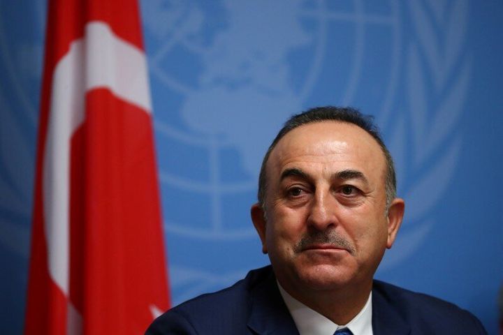 Turkey's FM Mevlut Cavusoglu attends a news conference in Geneva