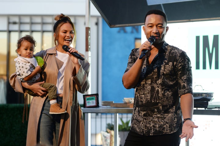 Miles Stephens, Chrissy Teigen and John Legend attend the Impossible Foods Grocery Los Angeles Launch on Sept. 19 in Los Angeles. 