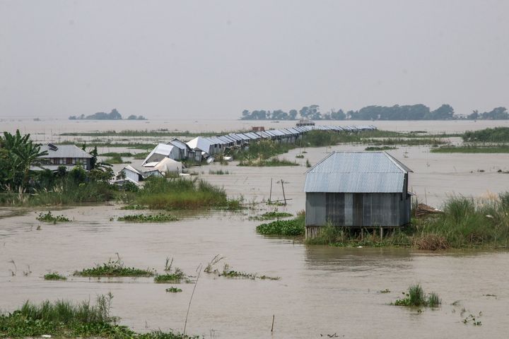 Flooded homes along the Padma River in Goalanda, Bangladesh, in September. Millions of people across the country lost their houses, crops and villages.