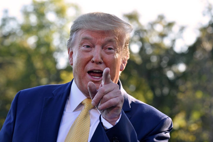 President Donald Trump speaks to the press at the White House after announcing an initial deal with China on October 11, 2019.