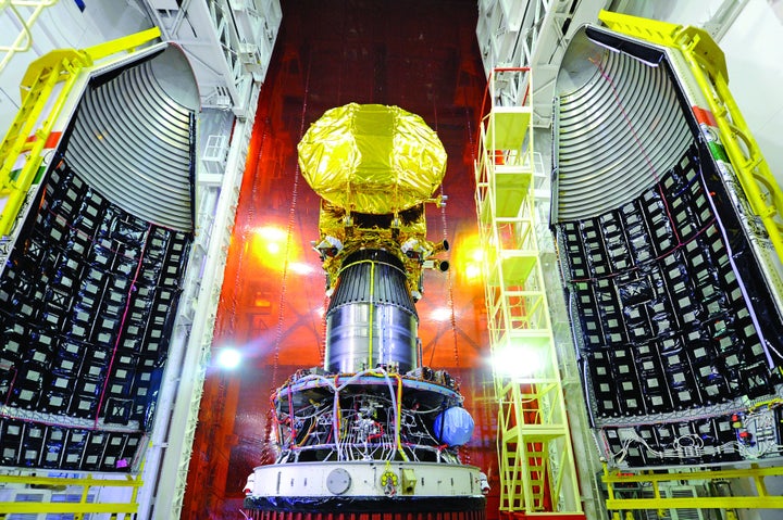 Mars Orbiter spacecraft mounted on top of the PSLV, just before heat-shield closure. 