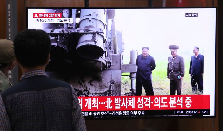 People watch a TV showing a file image of North Korean leader Kim Jong Un during a news program at the Seoul Railway Station in Seoul, South Korea, Thursday, Oct. 31, 2019. 