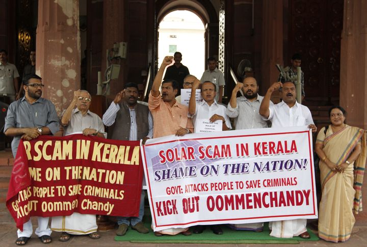 MPs from Kerala protesting at Parliament House against the Solar Scam in Kerala during Monsoon session on 12 August, 2013 in New Delhi.