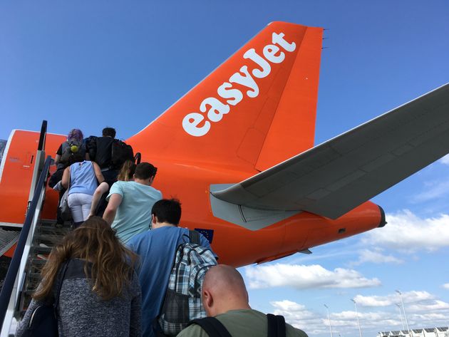 Gatwick, UK - August 08, 2017: Passengers boarding a easyJet airplane on the
