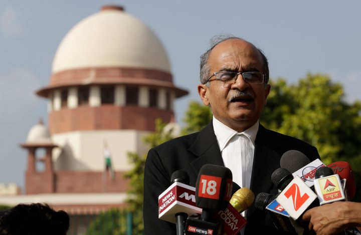 Senior Lawyer Prashant Bhushan speaks to the journalists outside the Supreme Court in New Delhi in this file photo.