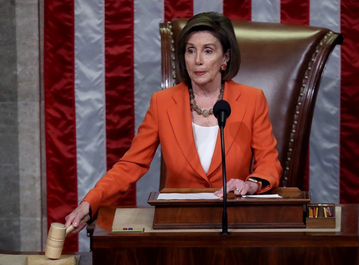 U.S. House Speaker Nancy Pelosi gavels the close of a vote by the U.S. House of Representatives on a resolution formalizing the impeachment inquiry focused on U.S. President Donald Trump on Thursday in Washington, D.C.