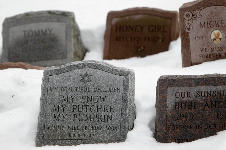 Headstones mark the graves of some of Rhona Levy's pets.