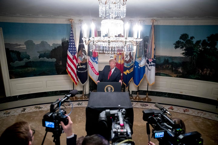President Donald Trump speaks in the Diplomatic Room of the White House in Washington, Sunday, Oct. 27, 2019, to announce tha