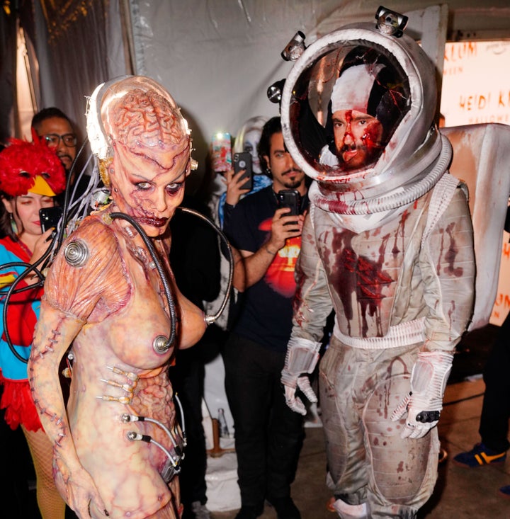 Heidi Klum and husband Tom Kaulitz made a blood-soaked debut at their annual Halloween party in New York City.