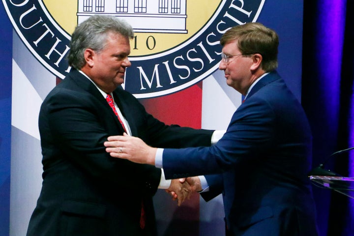 Democratic Mississippi Attorney General Jim Hood, left, and Republican Lt. Gov. Tate Reeves, right, shake hands at the conclusion of their first televised gubernatorial debate at the University of Southern Mississippi on Oct. 10, 2019.