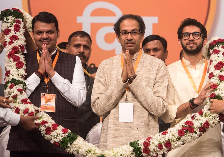Devendra Fadnavis with Shiv Sena chief Uddhav Thackeray and his son Aditya Thackeray in a file photo