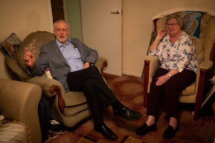 Labour Leader Jeremy Corbyn meets a local constituent, Sue Clark, 84, at her home in Islington, North London.