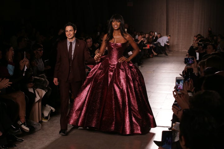 Posen and model Naomi Campbell walk the runway during the Zac Posen fashion show at Vanderbilt Hall on Feb. 16, 2015 in New York City.