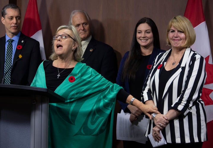 Green MP Paul Manly, left, John Kidder, and Green MP Jenica Atwin look on as party leader Elizabeth May announces Jo-Ann Roberts as the interim party leader during a news conference in Ottawa on Nov. 4, 2019. 