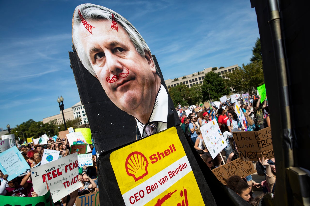 Youth carry along an effigy of Shell CEO Ben van Beurden for the Global Climate Strike protests on September 20, 2019 in Washington, DC. 