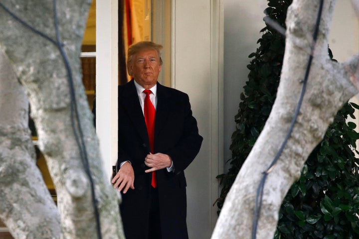 President Donald Trump walks out of the Oval Office to speak to members of the media on the South Lawn of the White House in Washington.