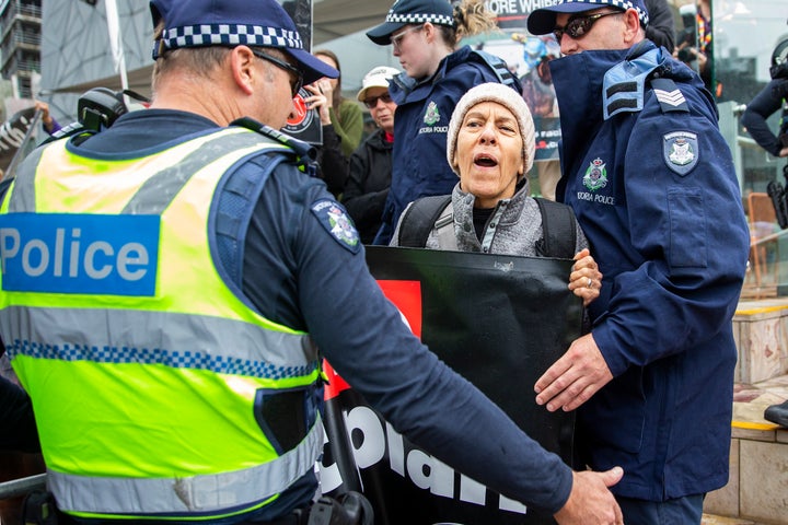 Protestors gathered at the 2019 Melbourne Cup Parade at Federation Square on Monday ahead of the big racing event on Tuesday.