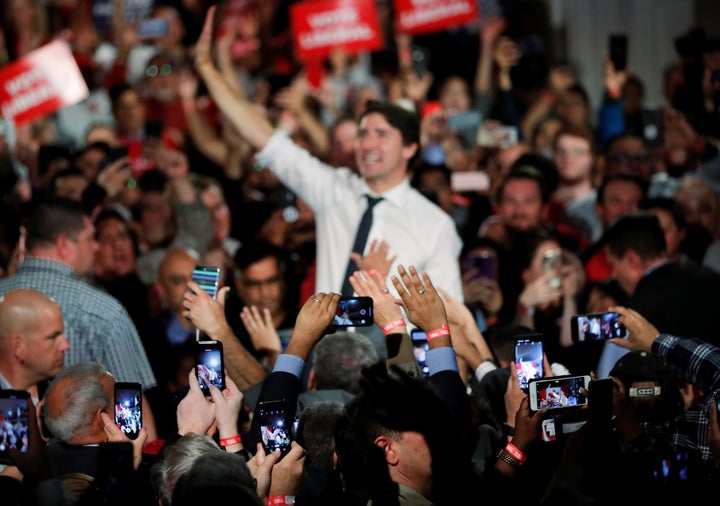 Justin Trudeau waves at a rally in Milton, Ont. on Oct. 19, 2019.