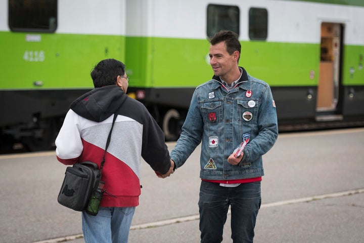 Liberal candidate Adam van Koeverden campaigns at the Milton GO Transit station on Oct. 17, 2019. 