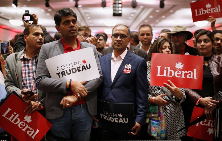 Liberal supporters wait for Justin Trudeau to attend a rally in Mississauga, Ont. on Oct. 12, 2019.