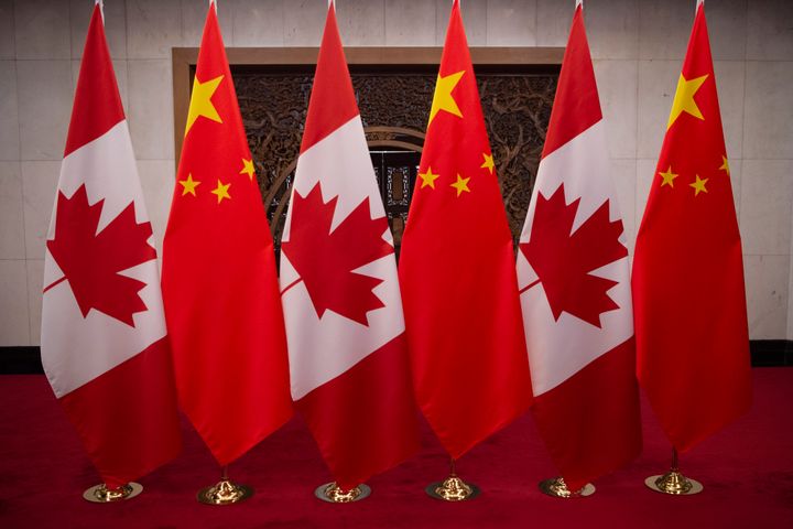 This picture taken on Dec. 5, 2017, shows the flags of Canada and China before a meeting between global leaders in Beijing.
